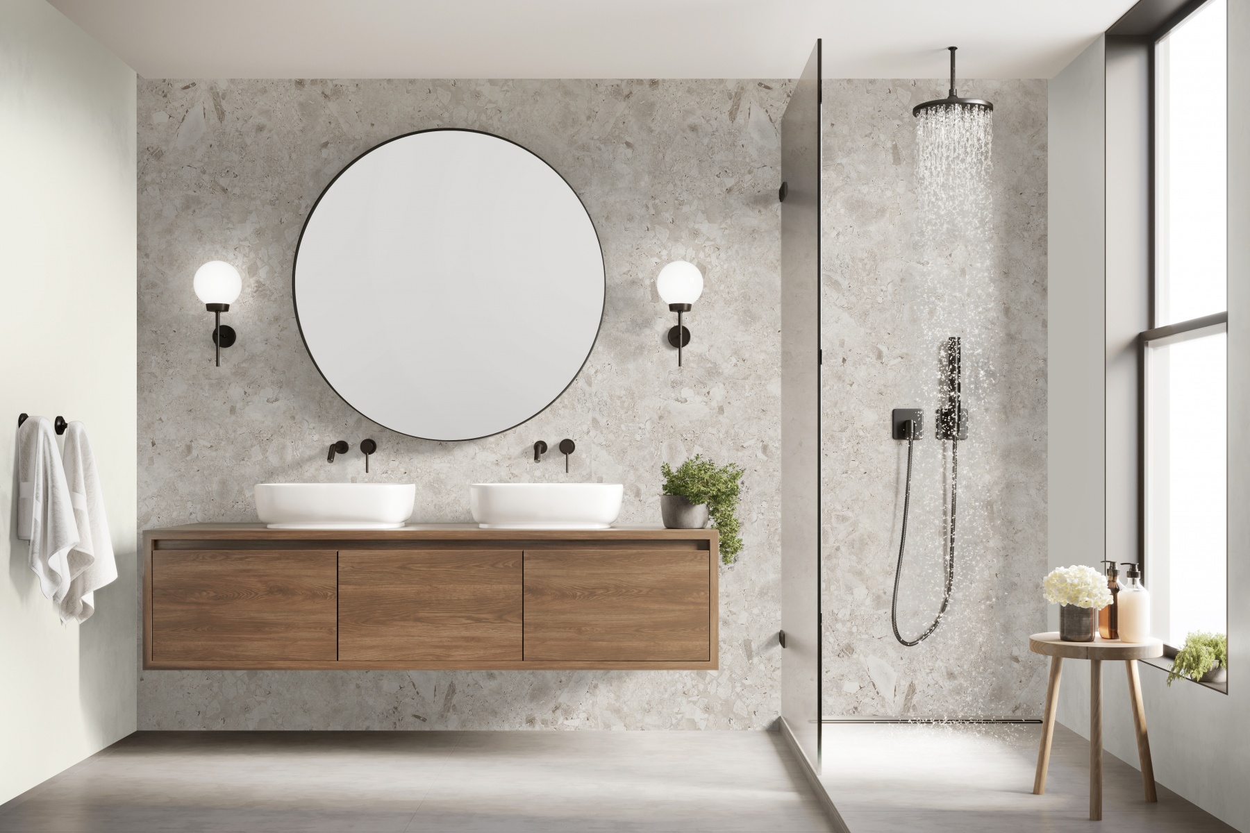 Helles, modernes Badezimmer mit Holzwaschtisch, zwei weißen Aufsatzwaschbecken, großem runden Spiegel und offener Regendusche mit schwarzer Armatur.